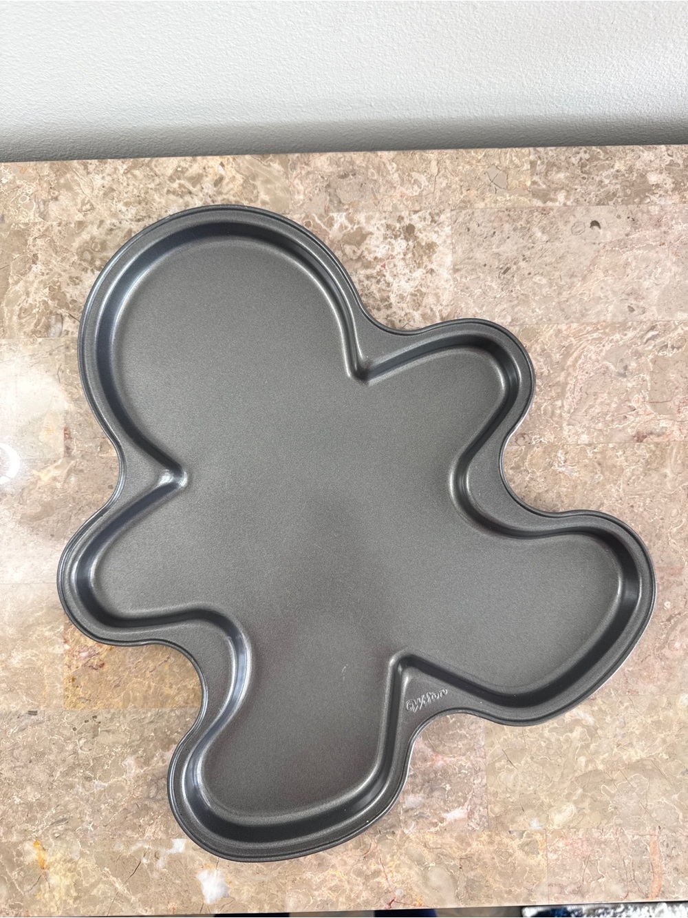 Wilton Gingerbread Man Shaped Baking Pan or cookie tray for baking